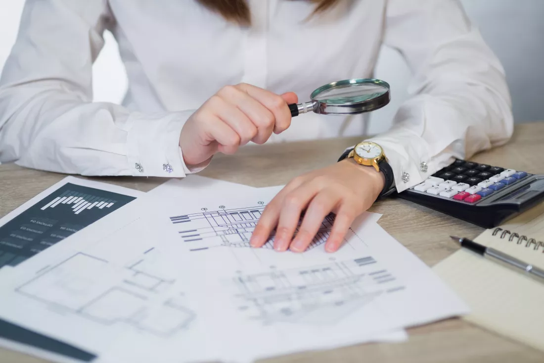 midsection-woman-working-table-office
