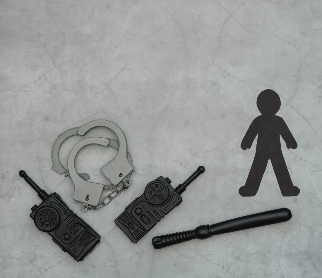 black-lives-matter-flat-lay-with-black-paper-silhouette-handcuffs-radio-stations-baton