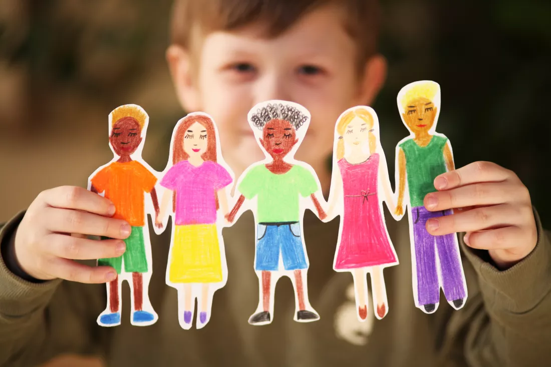 boy-holding-paper-homemade-garland-people-different-races